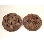 CEILING BOSSES. Two Victorian Gothic, carved pine ceiling bosses. Diameter 30cm.