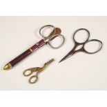 SCISSORS. A pair of miniature brass needlework scissors & two other pairs of scissors.