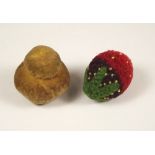 PIN CUSHIONS. Two 19th century pin cushions; a beaded strawberry & a velvet cottage loaf.