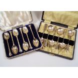 CASED SPOONS. Two sets of six cased, silver teaspoons.