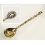 RUSSIAN SPOON. A Russian silver gilt & niello spoon. Length 11cm.