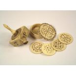 GAMING TOOLS. A 19th century bone gaming spinner, each side initialled P,H,N,T.