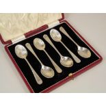 CASED SPOONS. A set of six feather edged teaspoons, by William Hutton & Sons Ltd. London 1897.