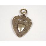 SILVER FOB. A silver watch chain fob.