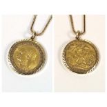 COIN PENDANT. A 1915 full sovereign in 9ct. gold pendant mount, on a 9ct. gold chain.