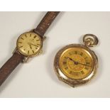 WATCHES. A 9k. fob watch & a lady's 1970's 9ct. gold cased Omega wristwatch.