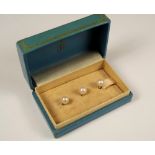 BIRKS STUDS. A set of three Birks cultured pearl & yellow metal studs, cased.