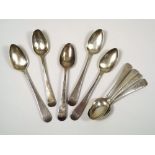 TEASPOONS. Four Edwardian engraved silver teaspoons & five various Georgian teaspoons.