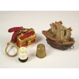 TAPE MEASURE ETC. A Galleon novelty tape measure & an Italian miniature trunk necessaire.