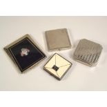 POWDER COMPACTS. A 1950's Stratton black enamelled powder compact & three French powder compacts.