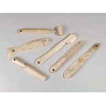 TEETHING STICKS. Six marine ivory teething or gum sticks.