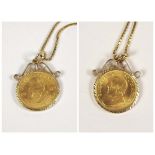 COIN PENDANT. A 1982, 1/10 Krugerrand coin, in 9ct. gold pendant mount on 9ct. gold box link chain.