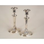 CANDLESTICKS. A pair of modern Adams-style candlesticks, Birmingham 1965. Height 24.5cm.