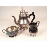 TEA SERVICE. A 1970's three piece silver tea service, with applied decoration. 41oz.