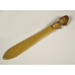PAPER KNIFE. A small celluloid paper knife with Admiral finial.
