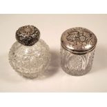 TOILET JAR ETC. A silver mounted toilet jar & a cut glass scent bottle with dissimilar lid.