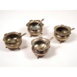 ELKINGTON SALTS. A set of four open salts with matching spoons (some damage).