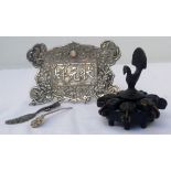 Chinese white metal embossed plaque, 11cm wide, together with a small comb and pick, and a bronze
