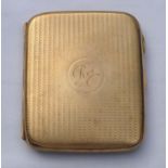 9ct gold marked cigarette case, machined body, 8.5x7cm, inscription to interior with date 1918,