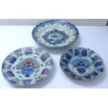 Large Delft blue & white deep plate with raised floral centre, 34cm diameter, together with