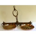 Large Degrave Short & Co black painted and gilt decorated iron beam balance scales with two copper