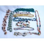 Large assortment of bead necklaces including glass and stone