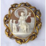 Shell cameo brooch depicting Hebe bearing a cup with the eagle Zeus by her side, set into a yellow