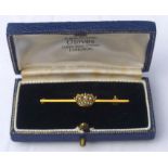 9ct yellow gold bar brooch set with a crown covered with pearls, 2.7g, in Gieves of Bond Street