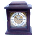 Mantel clock in wooden case, the silvered and gilt dial inscribed Roy Emmess Malling, 28cm high