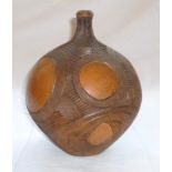 Harry Juniper unglazed ceramic vase of globular bottleneck form, intricately incised with abstract