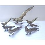 Collection of seven French gilt metal table pheasants, the largest with spread wings 44cm long