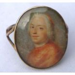 Georgian oval portrait miniature ring depicting a gentleman, 2.3cm high