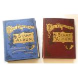 Two gilt highlighted Lincoln stamp albums containing a collection of Victorian and early 20th