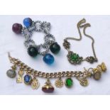 Assorted jewellery including white metal bracelet with coloured glass spheres and yellow metal charm