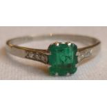 Square cut emerald ring, flanked by six diamonds, on platinum, approx size Q, in original Clifford &