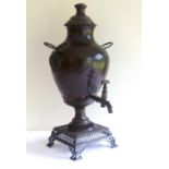 Regency period twin handled copper tea urn / samovar with stepped lid and fish shape tap, sea dragon