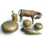Collection of bronze / brass items including model of a cow, powder flask, pepper grinder and