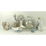 A group of Lladro figurines, comprising Saturday's Child, 6021, 21cm, Following Her Cats, 1309,