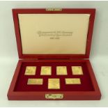 A group of seven gold plated sterling silver reproduction stamps, 'The Coronation Issue',