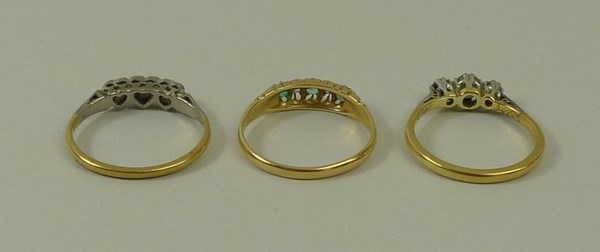 An 18ct gold, diamond and emerald five stone ring, size N, - Image 2 of 2