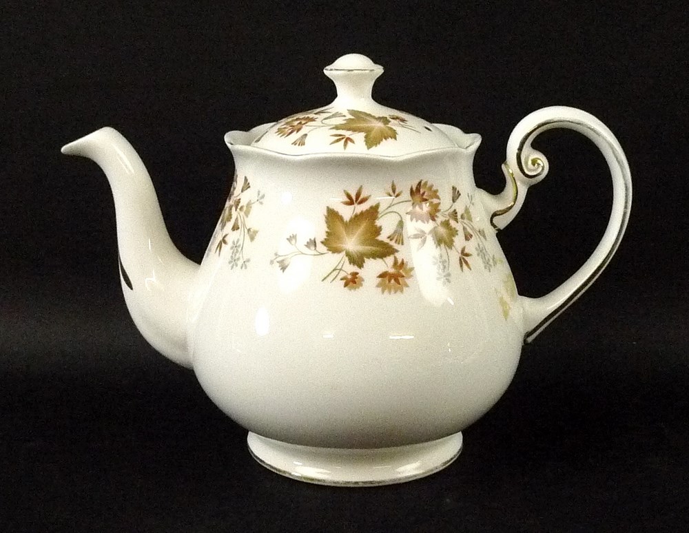 A Colclough part dinner service number T082, decorated with autumn foliage, comprising tea pot,