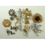 A quantity of costume jewellery comprising a pair of sterling silver cufflinks in the form of a