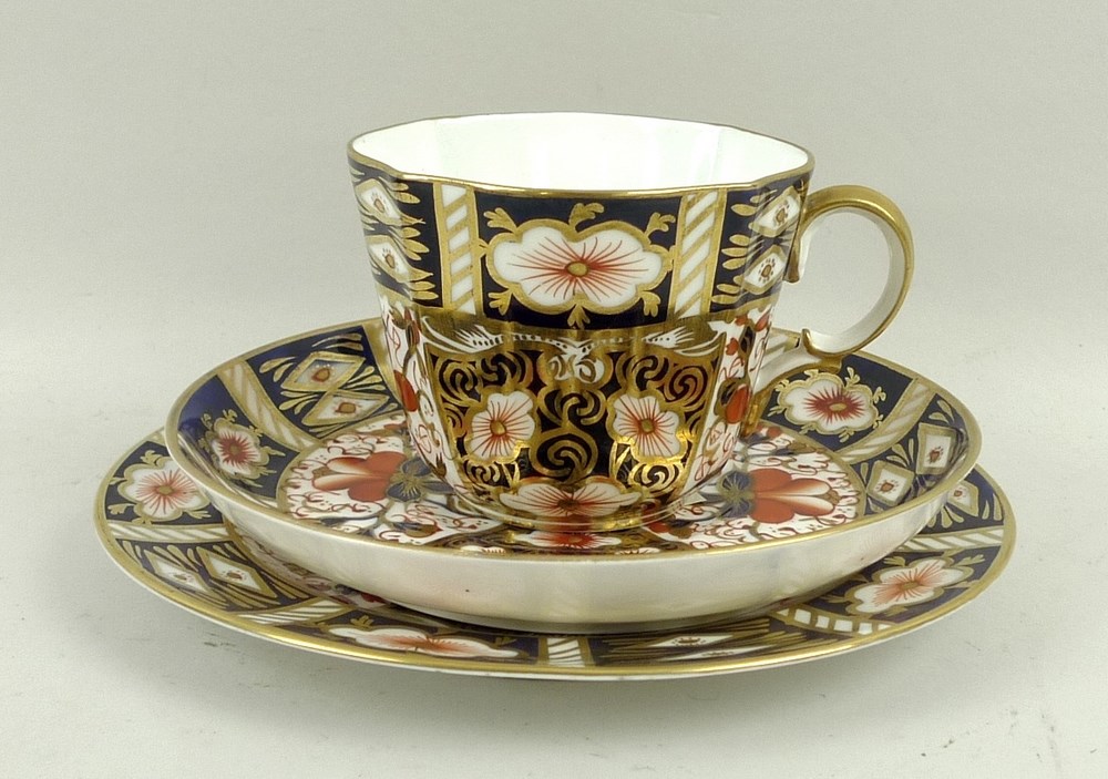 A Royal Crown Derby part tea service, in the Imari pattern, marked 2451, comprising six tea cups,