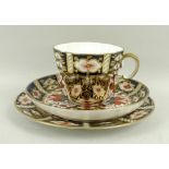 A Royal Crown Derby part tea service, in the Imari pattern, marked 2451, comprising six tea cups,
