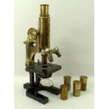 A Carl Zeiss Jena microscope, number 36230, with four lenses and cases, in fitted mahogany case,