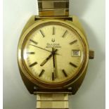 A gentleman's Bulova Accutron watch, the circular dial with baton numerals and date aperture,