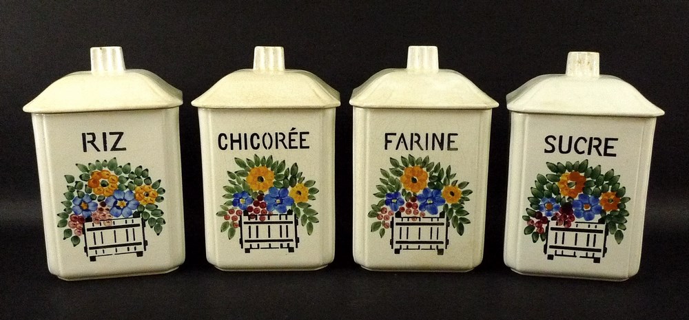 A set of four F Fleure ceramic square form storage jars, labelled 'Sucre', 'Chicoree', 'Farine',
