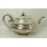A Scottish early 19th century silver teapot of squat form,