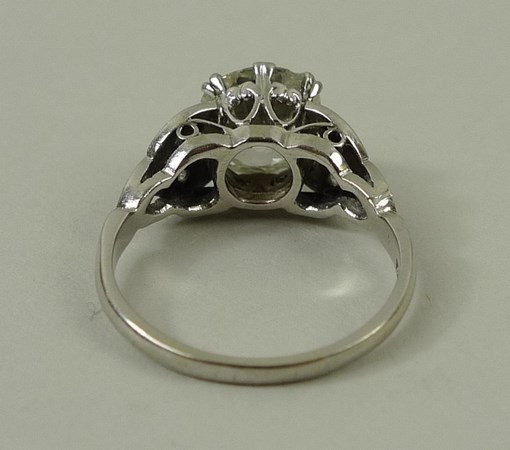 A platinum and diamond solitaire ring, the central old cut diamond approximately 1. - Image 3 of 3