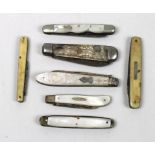 A silver and engraved mother of pearl pen knife hallmarked 1898,